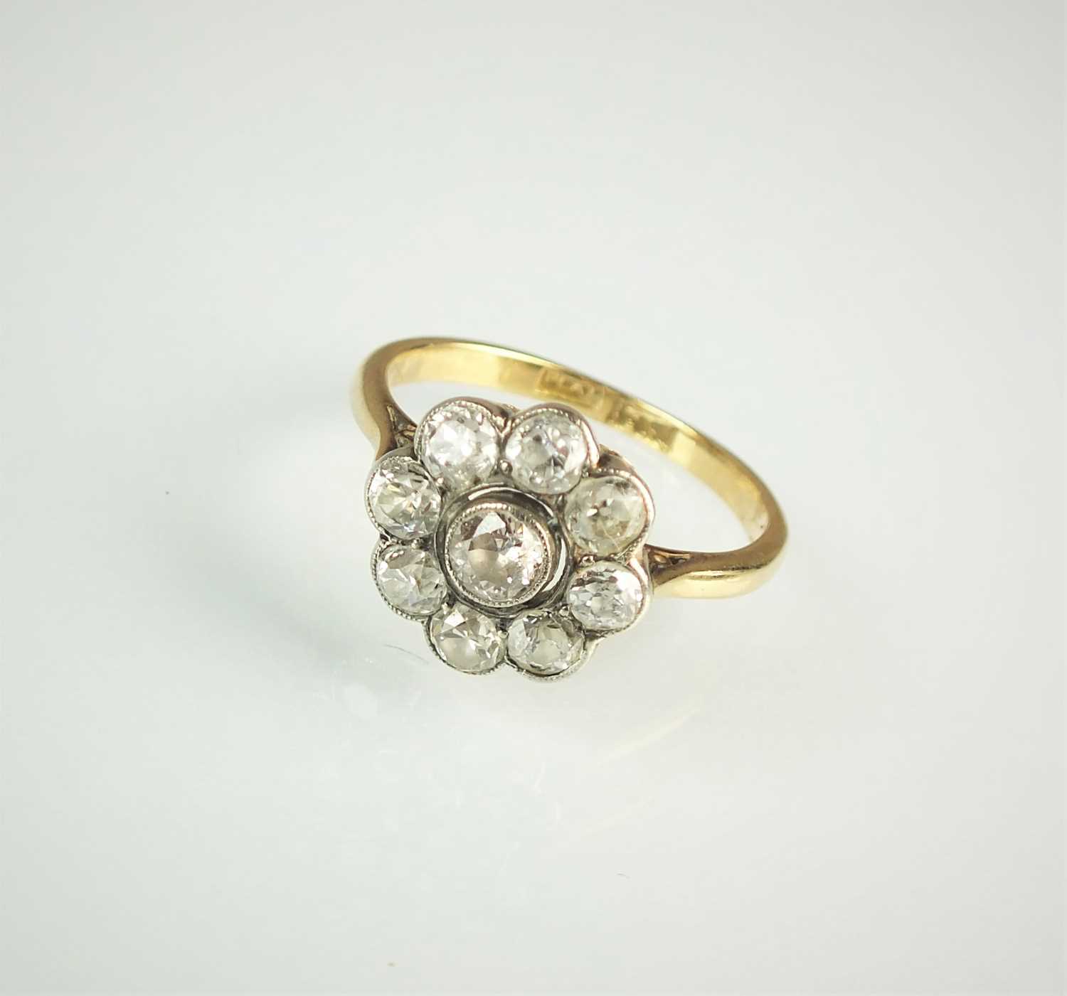 Lot 160 - A diamond floral cluster ring