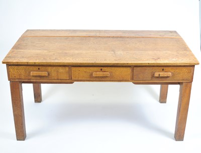 Lot 552 - An early 20th century oak plan / draughtsman's desk