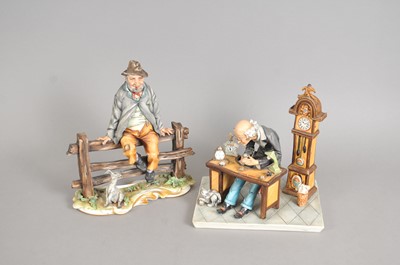 Lot 303 - A Capodmonte figure of a 'Watchmaker' and a man on a fence