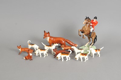 Lot 194 - Beswick Rearing Huntsman, hounds and foxes