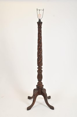 Lot 354 - A large carved mahogany standard lamp