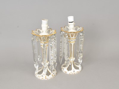 Lot 180 - A pair of Victorian slice cut opaque and clear crystal table lustres