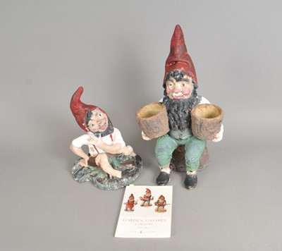 Lot 404 - Two (later) painted late 19th / early 20th century terracotta garden gnomes