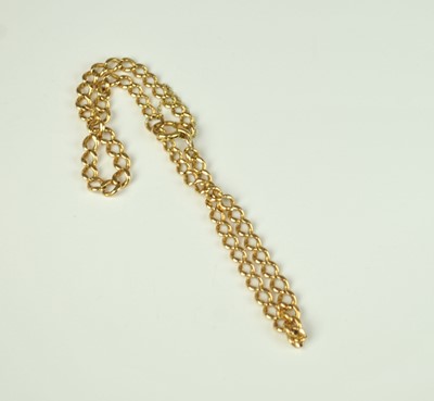Lot 153 - A 9ct gold double curb link bracelet