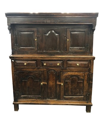 Lot 377 - A large 18th century and later oak food cupboard or dudarn