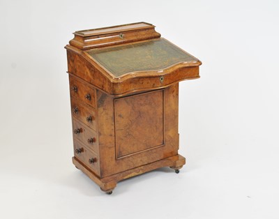 Lot 378 - A Victorian walnut veneered Davenport