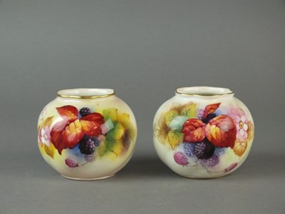 Lot 350 - A pair of Royal Worcester vases painted by Kitty Blake