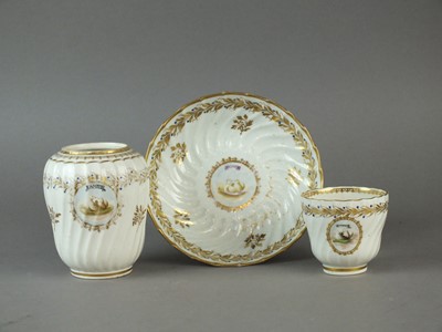 Lot 212 - A Caughley tea canister, coffee cup and saucer in the 'L'Amitie' pattern
