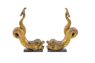 Lot 469 - A pair of Regency giltwood dolphins, on later...