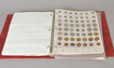 Lot 173 - An album containing a large collection of British and World coins