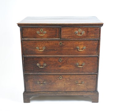 Lot 408 - A 19th century country oak chest of two short and three long graduated drawers