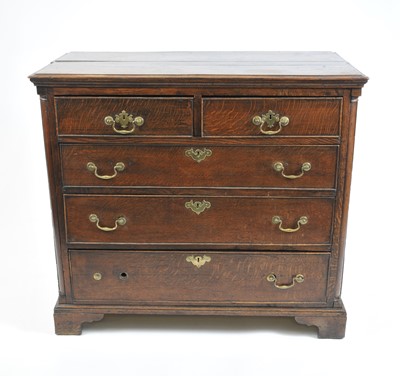 Lot 409 - A 19th century country oak chest of two short and three long drawers