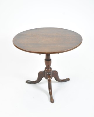 Lot 404 - A 19th century snap-top country oak occasional table