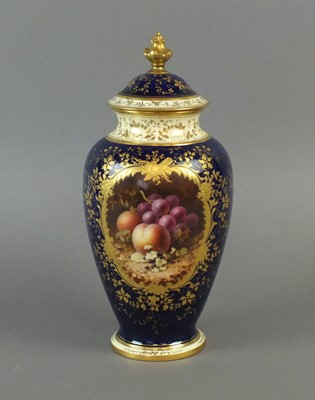 Lot 344 - A Coalport vase and cover decorated with fruit