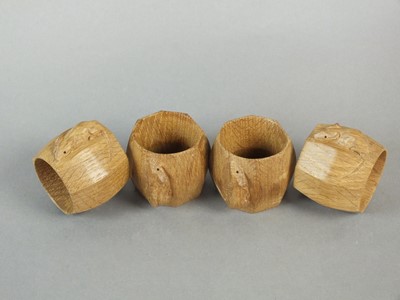 Lot 433 - Workshop of Robert Mouseman Thompson (Kilburn) a set of four oak napkin rings