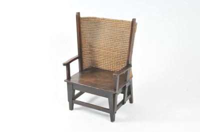 Lot 497 - A small child's stained pine Orkney chair