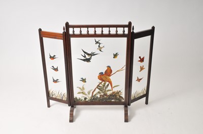 Lot 495 - A mahogany framed triptych fire screen