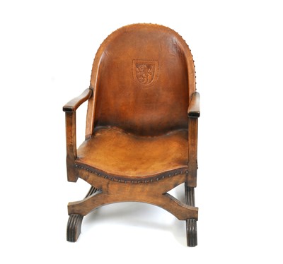 Lot 546 - A small early 20th century library chair