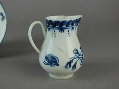 Lot 227 - Caughley teabowl and saucer and a Liverpool sparrow beak jug
