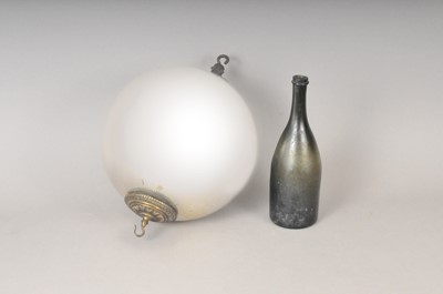 Lot 436 - A large late 19th or early 20th century silvered witches ball and an early glass bottle