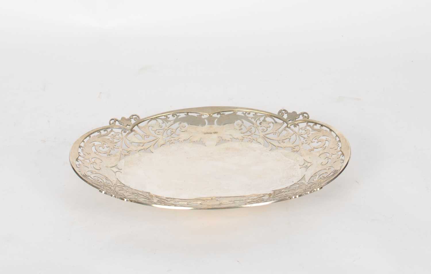 Lot 8 - An oval pierced silver dish