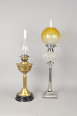 Lot 444 - A silver-plated Corinthian column oil lamp with shade and chimney and one other