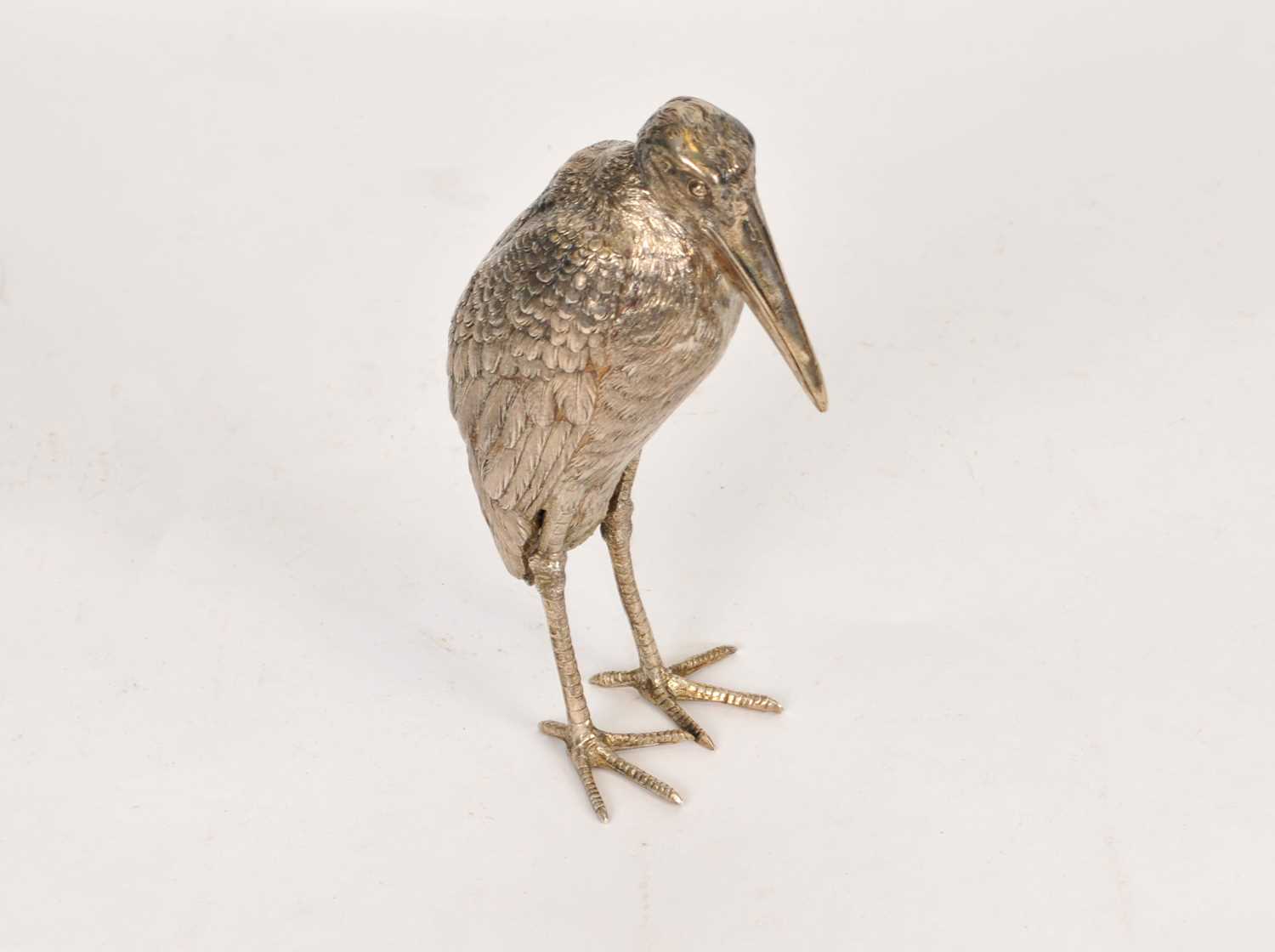 Lot 24 - A silver model of a standing crane or heron