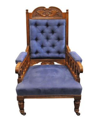 Lot 453 - An upholstered oak armchair, 110 cm high, 67...