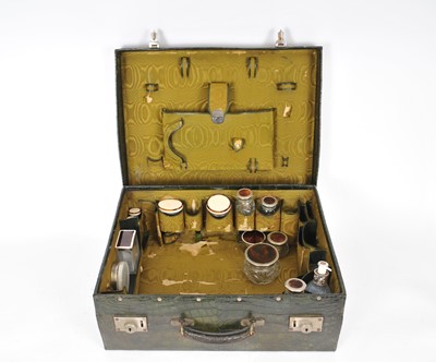 Lot 38 - An early 20th century crocodile skin mounted travelling vanity case