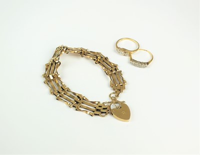 Lot 57 - A 9ct gold bracelet and two diamond set rings