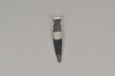 Lot 299 - A small Scottish silver-mounted sgian dubh