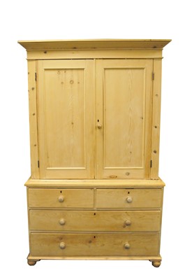 Lot 549 - A pale pine hall cupboard