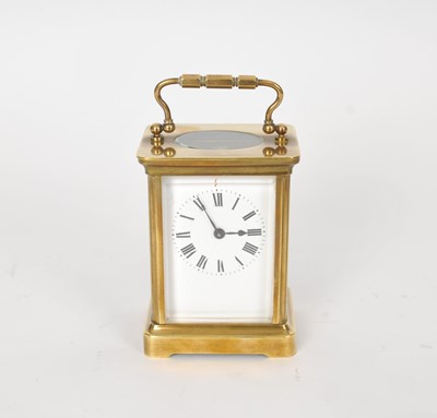 Lot 488 - A small brass cased carriage clock