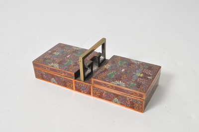 Lot 462 - A Chinese cloisonné enamel two-divisional cigarette box and a later cloisonné enamel egg