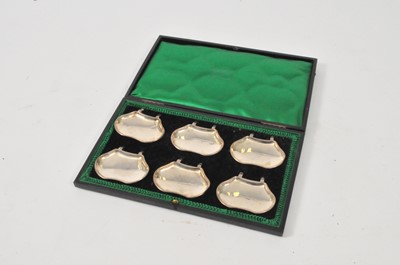 Lot 102 - An Edwardian cased set of six silver fish bone/pip dishes