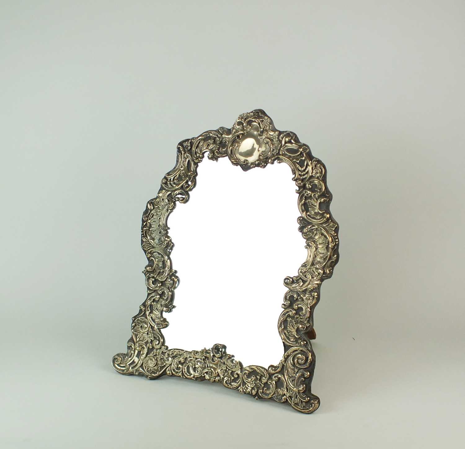 Lot 83 - An Art Nouveau silver mounted easel back mirror
