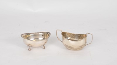 Lot 101 - A white metal salt and a silver sugar bowl