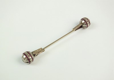 Lot 134 - A ruby and diamond orb jabot pin