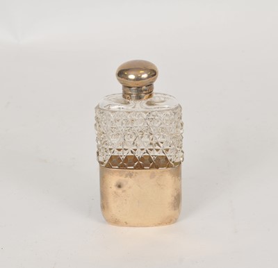 Lot 108 - A Victorian silver mounted glass hip flask