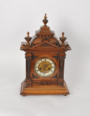 Lot 492 - A large Victorian architectural walnut cased mantle clock