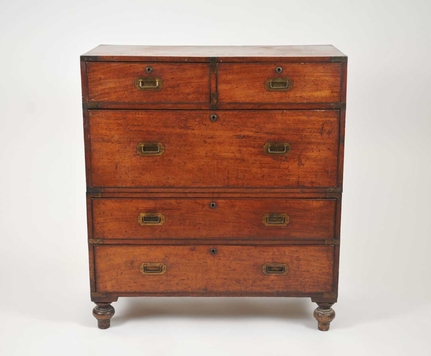 Lot 473 - A 19th century mahogany campaign chest of drawers