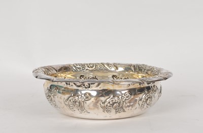 Lot 22 - A white metal circular bowl
