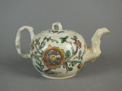 Lot 328 - Two Staffordshire salt-glaze stoneware teapots and covers