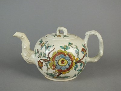 Lot 328 - Two Staffordshire salt-glaze stoneware teapots and covers