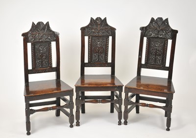 Lot 459 - A set of three 17th century oak chairs, each...