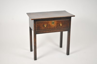 Lot 32 - An early-mid 18th century oak side table, the...