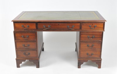 Lot 510 - A reproduction mahogany pedestal desk