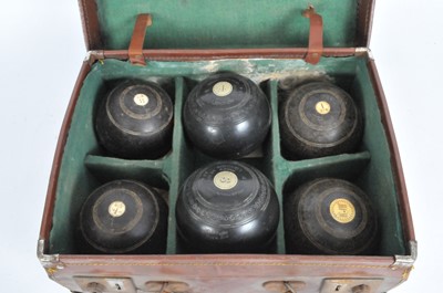 Lot 173 - A set of four hardwood bowls, inlaid with...