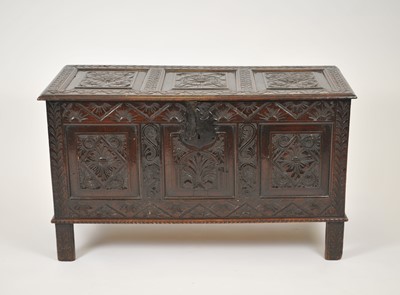 Lot 184 - A 17th century triple panelled coffer, later...