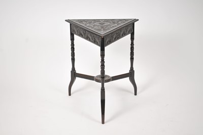 Lot 165 - A late Victorian stained, carved oak,...